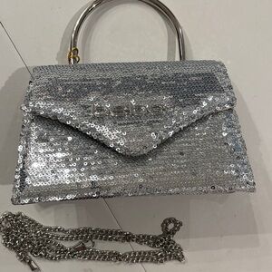 Bebe Sparkling Silver Sequin Clutch